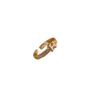 Gold plated H-letter open ring with sparkling cubic zirconia baguette stones