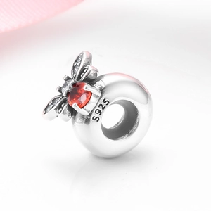 S925 sterling silver bee charm with red gemstone and zircon accents on a round bead