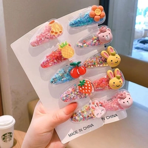 Detail of 8pcs glitter hair clips with 3D resin cartoon fruit and animal patterns