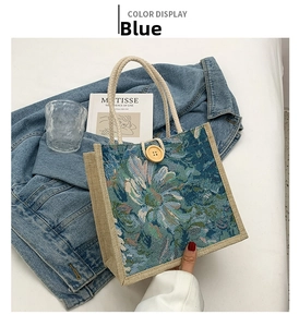 Detailed blue floral jacquard tote bag with linen edges and cotton rope handles