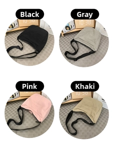 Selection of large capacity crossbody bags in black, grey, pink, and khaki colors