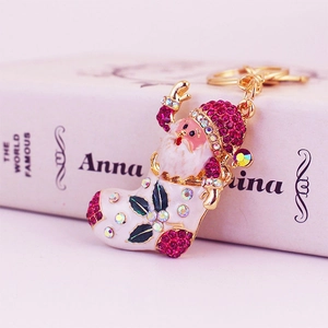 Christmas Santa Claus in stocking keychain with colorful rhinestones and gold plating