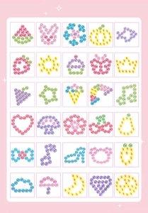 Detail view of 30 colorful DIY gem stickers for hair including hearts and flowers