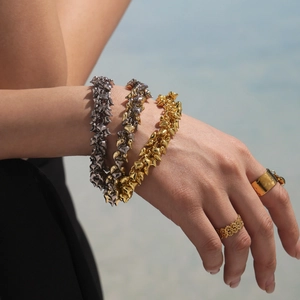 Industrial style heart pendant chain bracelets and rings set in gold and silver finish