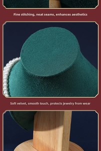 Detail of green velvet necklace stand with wood base and fine stitching craftsmanship