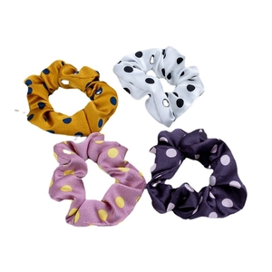 Silk-like scrunchies set with polka dots in yellow white pink and purple colors