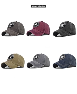 Close-up of vintage washed baseball caps with star embroidery and distressed details