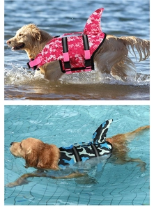 Detail of pet life jacket with shark fin, durable oxford cloth, and safety handle