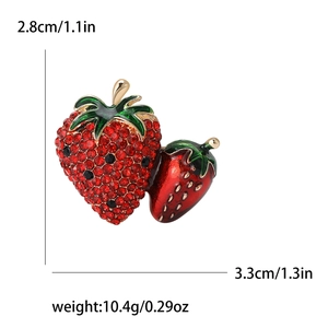 Sparkling red rhinestone and enamel strawberry brooch pin with green leaves for women
