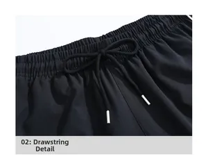 Close-up of elastic waistband with adjustable drawstring on black ice silk trousers