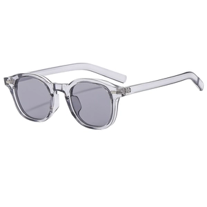 Retro oval sunglasses with transparent grey frame and grey lenses in a 45-degree side view