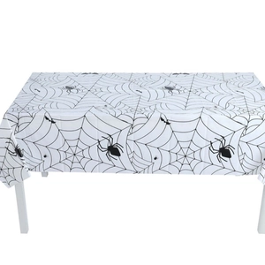 Detail shot of the Halloween spider web pattern printed on a waterproof white tablecloth