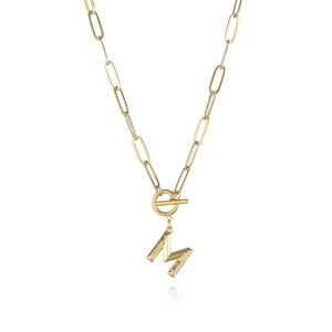 Detailed view of golden paperclip chain with letter M pendant and toggle clasp