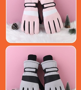 Detail of waterproof winter ski gloves with adjustable velcro strap and windproof cuffs