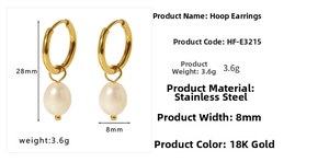 Detail view of 18K gold plated stainless steel hoops with white freshwater pearl charms
