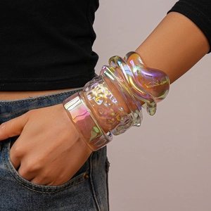 Iridescent acrylic geometric bangles featuring iridescent finish and textured surface detail