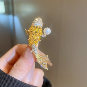 Elegant Chinese style koi fish brooch with golden scales, cubic zirconia, and white pearl