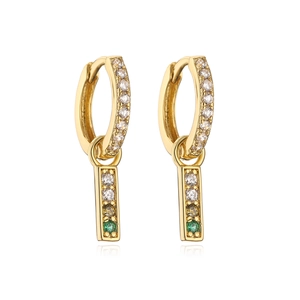 Detail of 18K gold plated huggie earrings with white zircon paving and green gemstone drop