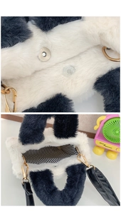 Detail of the magnetic buckle, striped lining and golden hardware on the panda plush bag