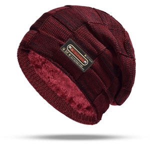 Men's dark red cable knit winter beanie with thick faux fur lining for warmth