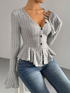 Elegant grey V-neck knit cardigan with ruffle hem and slim fit ribbed long sleeves