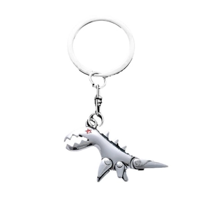 3D metallic dinosaur keychain in silver finish with red star and segmented body design