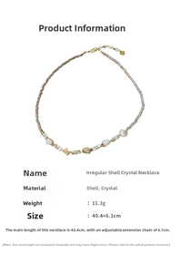 Close-up of irregular shell and crystal beaded necklace showing size and weight details