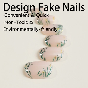 Press-on nails with pink base, green leaf patterns and gold foil accents on white background