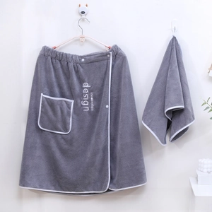Close-up of gray coral fleece bath wrap set with embroidery and practical pocket