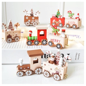 Detailed view of colorful wooden Christmas train with snowman and mini tree decorations