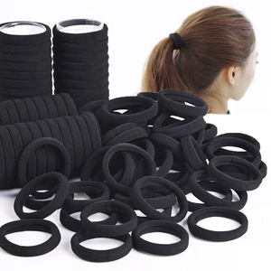 4cm black high elasticity seamless hair ties for women with ponytail styling demonstration