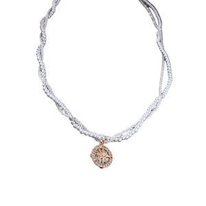 Collana vintage placcata in oro con catena di perle e ciondolo a stella in zirconi