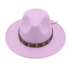 Detail of lavender fedora with ethnic brown band featuring metallic and shell accents