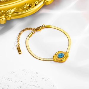 Bohemian gold stainless steel snake chain bracelet featuring an oval turquoise stone inlay