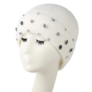 Women's warm knit beanie in cream white with stylish rhinestones on white mannequin head
