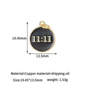 Detailed macro of a gold-edged black enamel pendant featuring the engraved 11:11 number