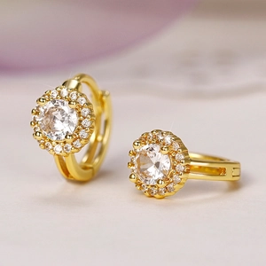 Detailed close-up of gold-plated hoop earrings with micro-pave round zircon stones