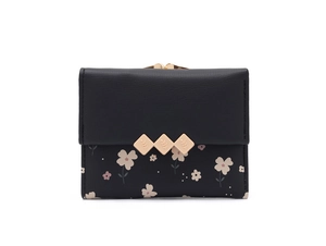 Detailed close-up of a floral print tri-fold wallet with elegant gold metal hardware accents