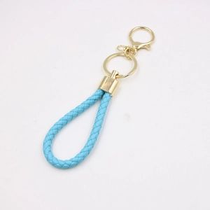 Sky blue braided leather keychain detail with premium golden metal lobster clasp