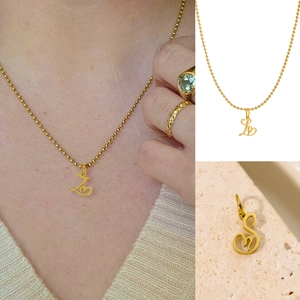 Golden ball chain necklace with artistic heart letter pendant shown in three views