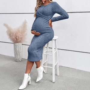 Elegant long sleeve blue maternity dress with twisted front and ribbed knit texture