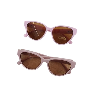 Pink cat-eye frame children sunglasses with brown UV400 lenses on a white background