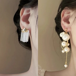 Elegant white floral shell and pearl dangle earrings with gold metal tassels for women