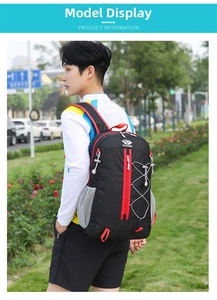 Outdoor backpack detail showing ergonomic red straps and brand logo during hiking