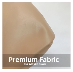 Close-up of premium cream faux leather texture on a large bow tote bag detail