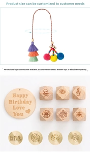 Macro detail of bohemian tassel pendant with custom engraved wood and metal tags
