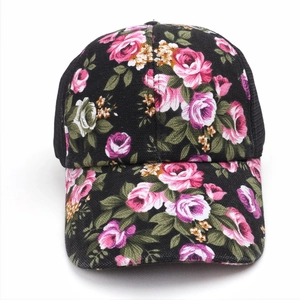 Detail of floral printed baseball cap with pink roses and black breathable mesh back