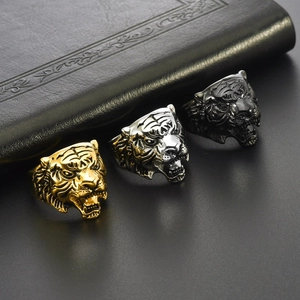 Vintage stainless steel tiger head rings for men in gold, silver, and gun black finishes