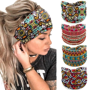 Detail of bohemian wide elastic headbands with vibrant African floral and geometric prints