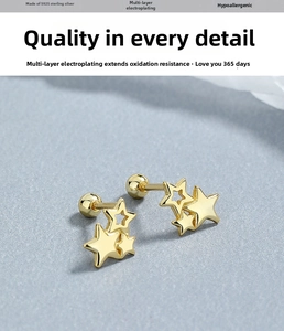 Macro view of three gold stars on S925 silver stud earring with threaded screw back
